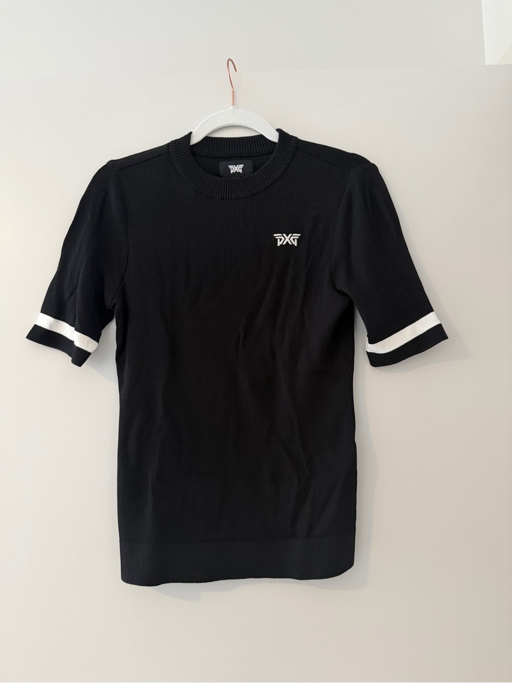 PXG Black Short-Sleeve Knit Shirt with White Sleeve Bands